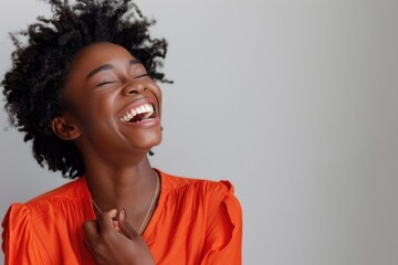 Aufkleber - Cheerful woman wearing an orange shirt, suitable for lifestyle and fashion themes