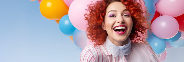 a woman with red curly hair and a bunch of balloons