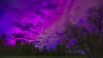 Poster - moving clouds on night timelapse with aurora borealis