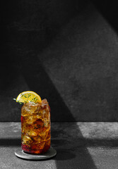 Wall Mural - cocktail with cola decorated with lemon