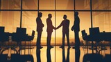 Fototapeta  - Silhouetted Businessmen Shaking Hands in Office at Sunset