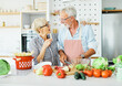 © Lumos sp - love kitchen senior woman man couple home retirement happy food smiling husband wife together person