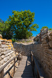Fototapeta Pomosty - Ruins of Troy and wooden walkway. Visit Turkey concept photo.