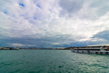 Fototapeta Pomosty - Istanbul view with cloudy sky and a boat. Visit Istanbul background