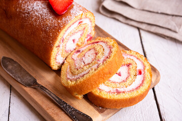 Wall Mural - Swiss roll with strawberries and cream, homemde dessert