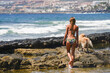 © Iliya Mitsk - a girl is an ideal vacation with a dog near the ocean