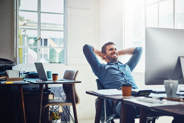 Leinwandbilder - Smile, relax and happy man at office desk for stretching, productivity or done with project. Break, computer and employee with arms behind head for satisfied, achievement or deadline complete