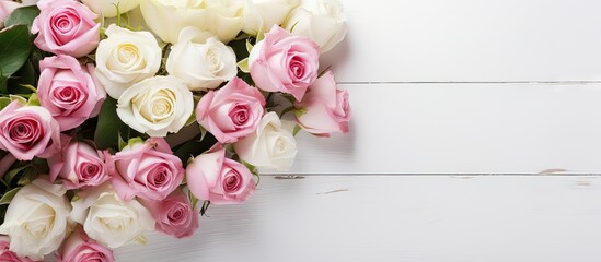 Poster - Top view of a light background with a bouquet of pink and white roses representing occasions like Mother s Day Valentine s Day and birthdays Ideal for greeting cards with ample copy space for text