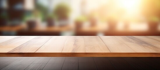 Poster - In a room with blurred background there is a wood table top that offers empty copy space for various purposes