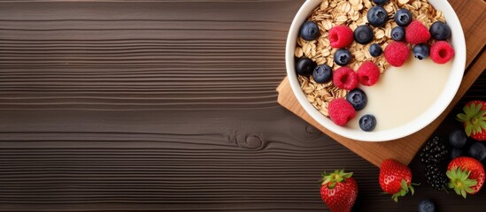 Poster - A top view of a bowl filled with oat granola milk and berries showcasing a nutritious and delicious breakfast option The image provides ample copy space for additional elements