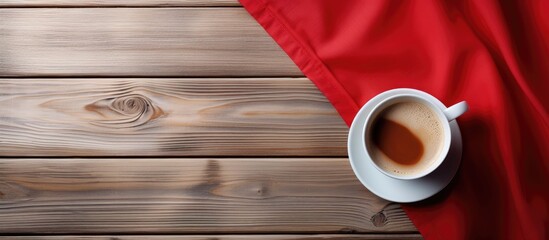 Aufkleber - White cup of coffee on wooden background and copy space with red handkerchief