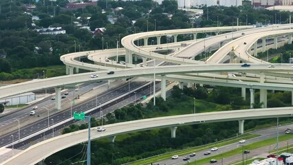 Canvas Print - Complex highway overpass elevated direction lanes with busy traffic in Tampa, Florida. American high speed road crossroads.