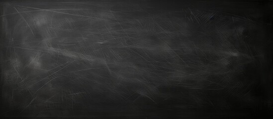 Poster - Image of a blank chalkboard with erased marks providing a clean surface for educational purposes. copy space available