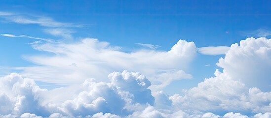 Leinwandbilder - The alternating blue sky and white clouds can serve as the background image. copy space available