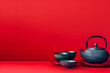 © STUDIO COLORS - A vibrant image of a traditional Japanese tea set on a solid red background