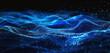 © Sehrish - Blue glowing wave with digital particles on dark.