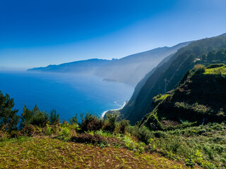 Wall Mural - Aerial view of Beautiful mountains and green hills in Madeira, Portugal.