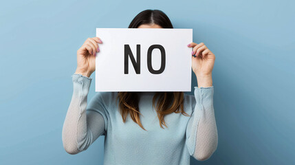 girl holding sign with the word 
