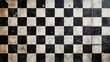 © Thanaporn - A checkered floor with black and white tiles
