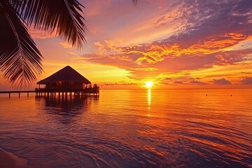Wall Mural - maldives resort island at sunset idyllic tropical paradise travel landscape photo