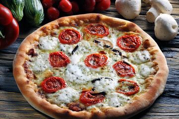 Wall Mural - Pizza mozzarella and tomato roasted in the wood oven