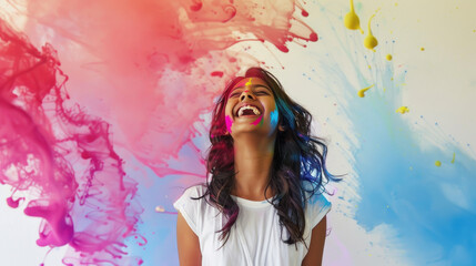 Canvas Print - Young indian woman celebrating holi festival