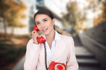 Wall Mural - business person using retro phone