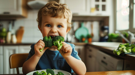 Poster - A young child with curly blond hair is enthusiastically eating a broccoli floret in a cozy kitchen setting, promoting healthy eating habits.