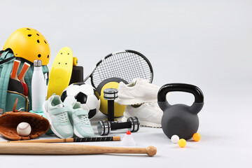 Canvas Print - Many different sports equipment on light grey background