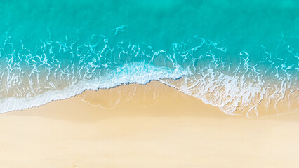 Wall Mural - top view beautiful sandy beach and soft blue ocean wave  background