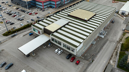 Sticker - Aerial view of a large industrial warehouse.