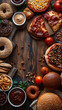 © Aom - Top view of Pizza, Crispy fried chicken, hamburger, donuts, in a wood table, empty space un the middle for text