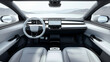 © visoot - The interior of the car is designed, cleanly, with a large screen in the center of the dashboard, a simple round steering wheel and a low back seat made of light gray fabric. Generative AI.
