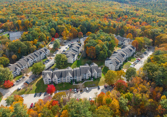 Wall Mural - aerial view of residential apartment community in autumn season