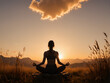 © Kevin - a tranquil scene of a woman meditating in a cross-legged pose on a grassy field at sunset, framed against a backdrop of mountains and a dramatically lit cloud above her