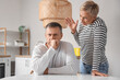 © Pixel-Shot - Mature couple quarreling in kitchen