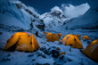 © EdvvinStudios - High altitude adventure: illuminated tents at everest base camp