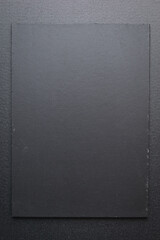 Sticker - blank black notebook on shine black background