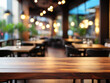 © ajibriant - Wooden table top on blur coffe shop background