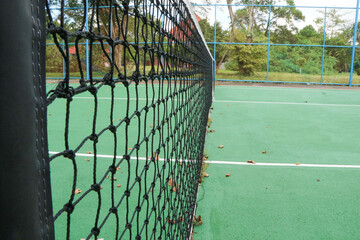 Tennis ball on blue tennis court. the concept of a sporty lifestyle.