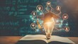 © kinza - E-learning graduate certificate program concept. lightbulb on the book with graduation hat, and education icons. Internet education course degree, Idea of learning online class.