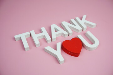 Canvas Print - Thank You alphabet letters top view on pink background