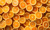 Fototapeta Do akwarium - Close-up of halved fresh oranges