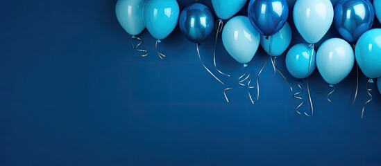 Wall Mural - Top view of blue background with copy space featuring festive balloons for a carnival festival or birthday holiday