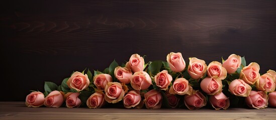 Poster - A stunning arrangement of roses on an elegant wooden table providing ample space for personalized messages