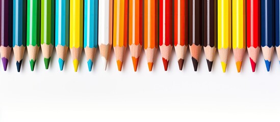 Aufkleber - A vibrant assortment of colored pencils on a blank white backdrop providing ample blank space for additional imagery