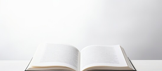 Poster - An open book with a white background providing space for text Copy space image