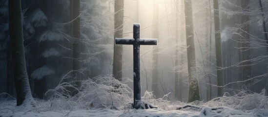 Poster - In a snowy forest a copy space image reveals a wooden cross symbolizing faith