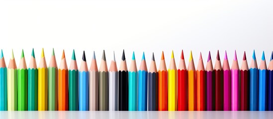 Aufkleber - Colorful pencils create a blurred pattern isolated on a white background providing ample copy space image