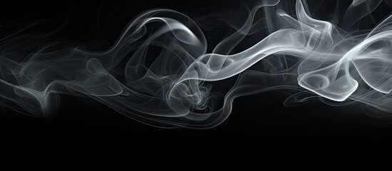 Leinwandbilder - Smoke on a black background creating copy space image